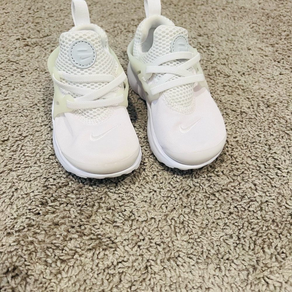 Nike. Toddler. White. Size 9. I think they fit more like an 8/9.